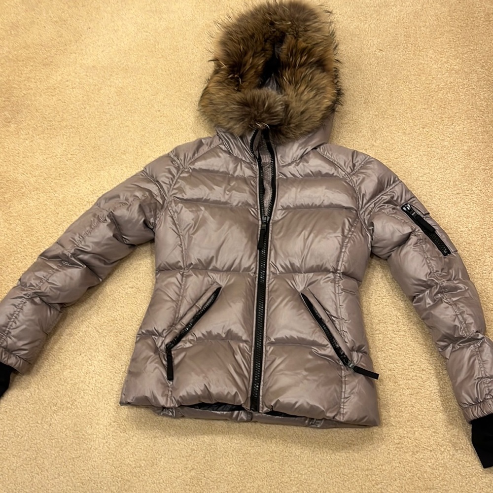 Sam jacket. Champagne puffer with fur hood lightly worn